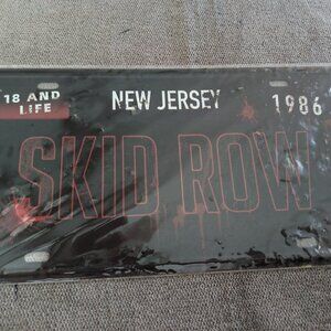 SKID ROW  METAL LICENSE PLATE  WIDTH IS 12  x 6   TOP  TO  BOTTOM